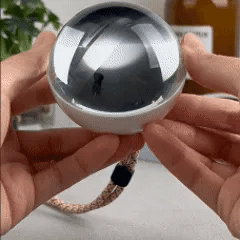 The Magic Crystal Ball — Hold the Breathing Memories in Your Hand.